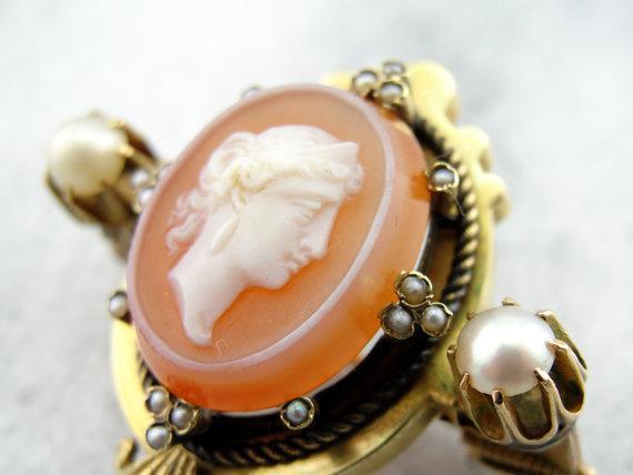 14 karat gold cameo sold