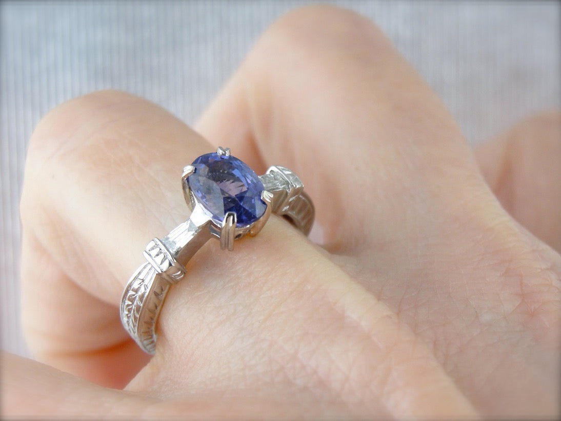 Contemporary Sapphire and Tapered Baguette Diamond Engagement Ring in Platinum