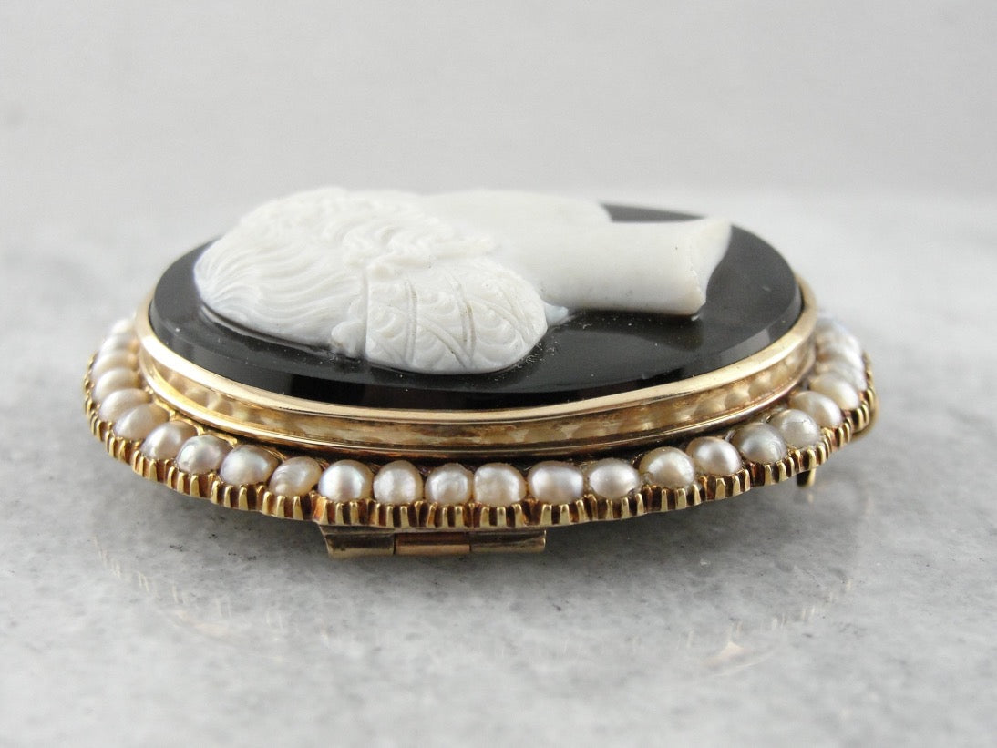 Pearl hot and onyx brooch