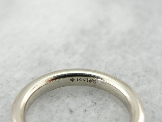 Classic White Gold and Diamond Infinity Wedding Band