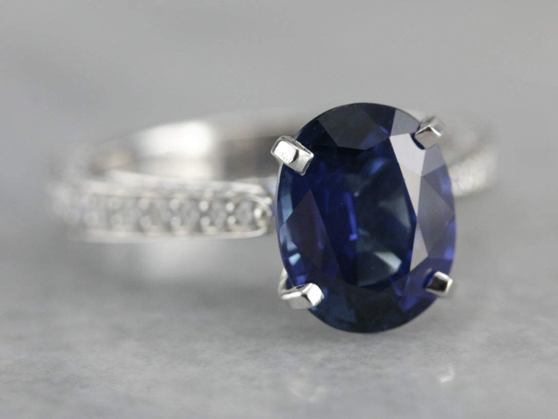 Luxurious Modern Sapphire and Diamond Engagement Ring in Platinum