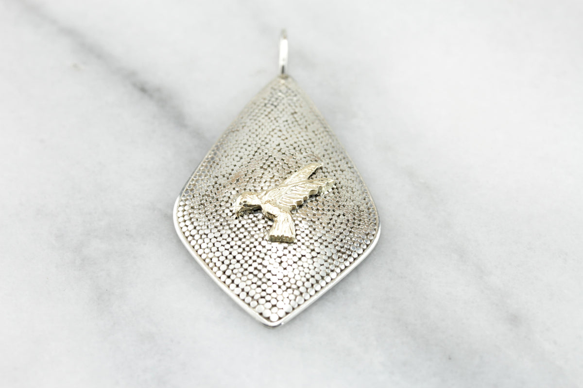 The Golden Parrot: Textured Bird in Flight Pendant