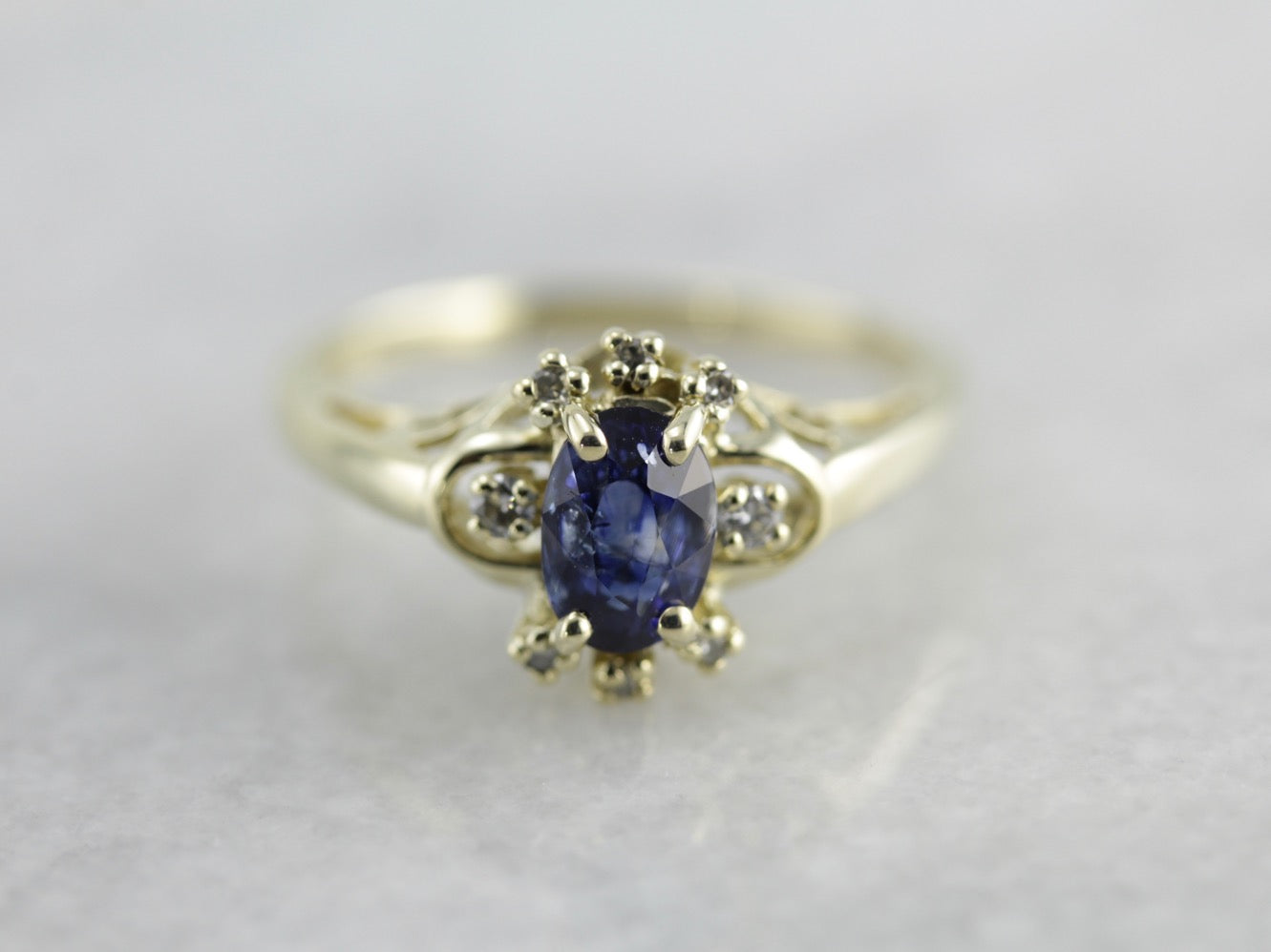 Sapphire Halo Ring in Green Gold