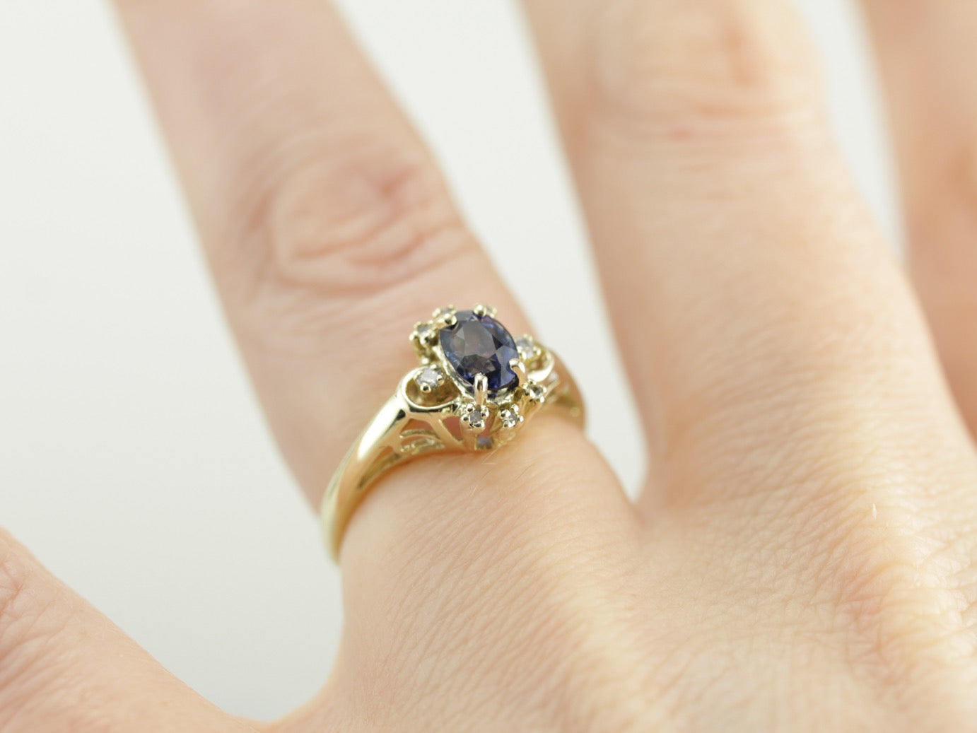 Sapphire Halo Ring in Green Gold