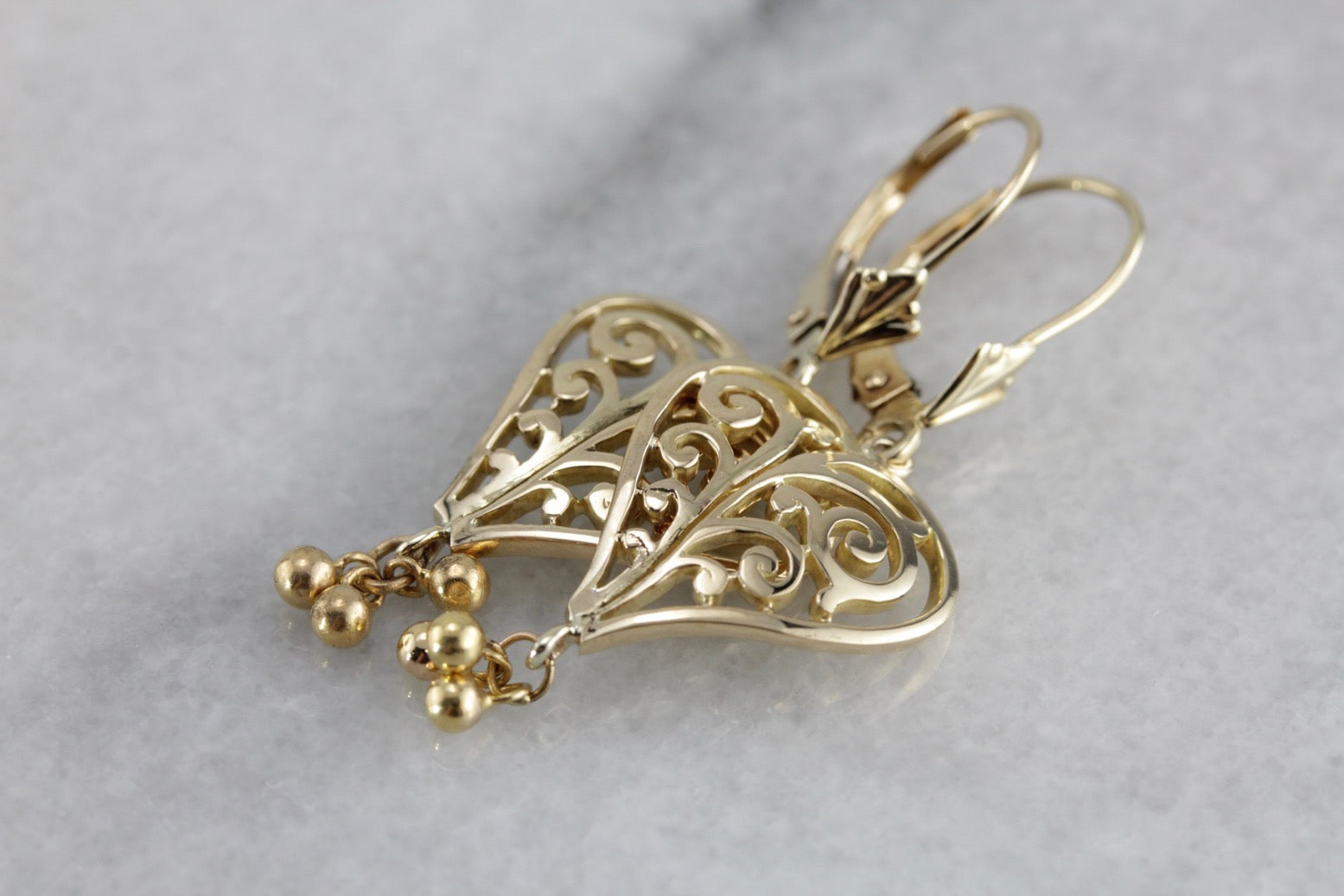 Scrolling Filigree Heart Earrings in Yellow Gold