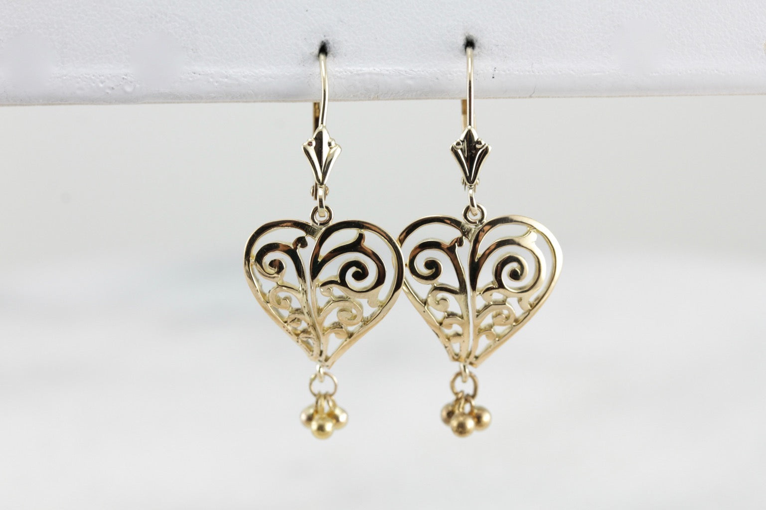 Scrolling Filigree Heart Earrings in Yellow Gold