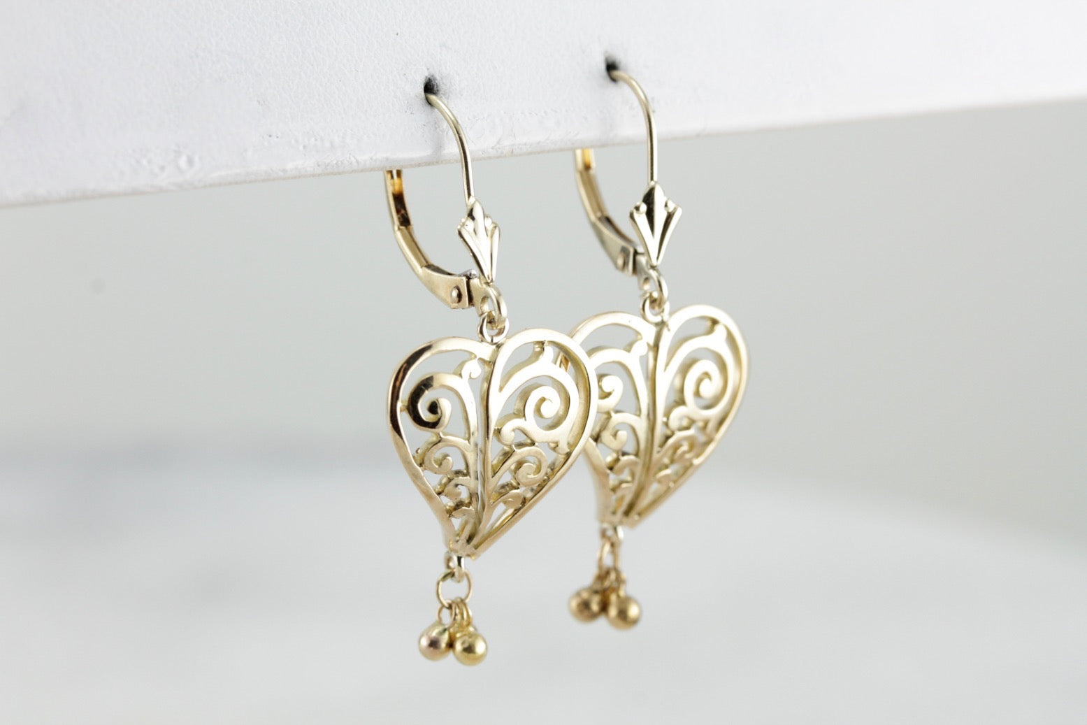 Scrolling Filigree Heart Earrings in Yellow Gold