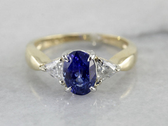 Sapphire and Trillion Cut Diamond Engagement Ring in Yellow Gold
