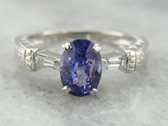 Contemporary Sapphire and Tapered Baguette Diamond Engagement Ring in Platinum