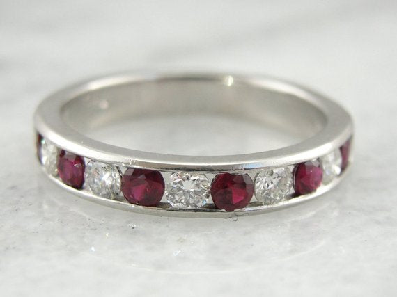 Classic Platinum Diamond and Ruby Channel Set Wedding Band