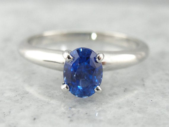 Tapered Platinum Sapphire Solitaire Ring