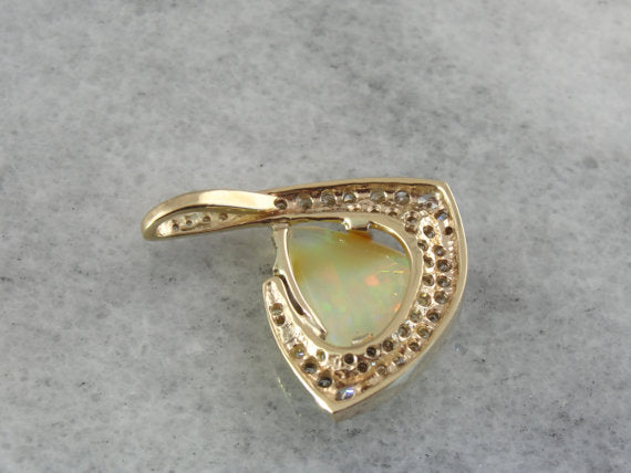 Ethiopian Opal Pendant in Modernist Gold and Diamond Frame