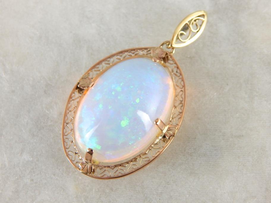 Important Collector&#39;s Gemstone Pendant, Ethiopian Opal in Filigree Gold